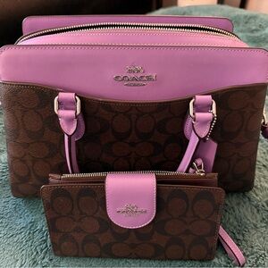 Purple COACH purse and wallet set.